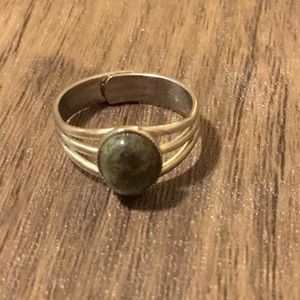 Silver ring with olive green stone